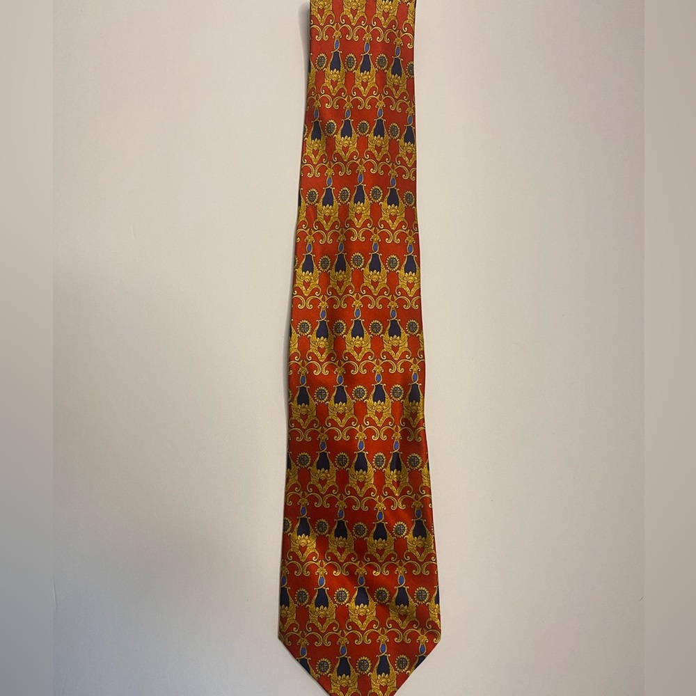 A Richel Royal Men’s Tie in the colors Navy Blue Red & Gold.